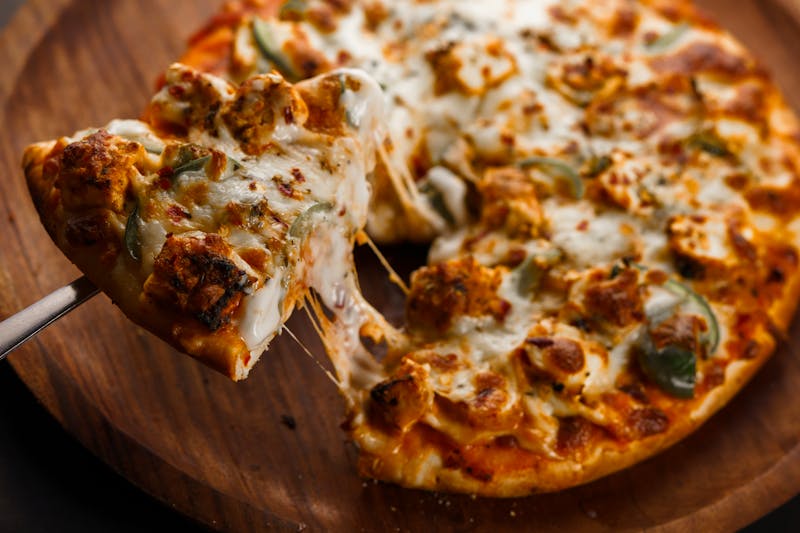 Four Cheese Pizza with mozzarella, cheddar, provolone and gouda